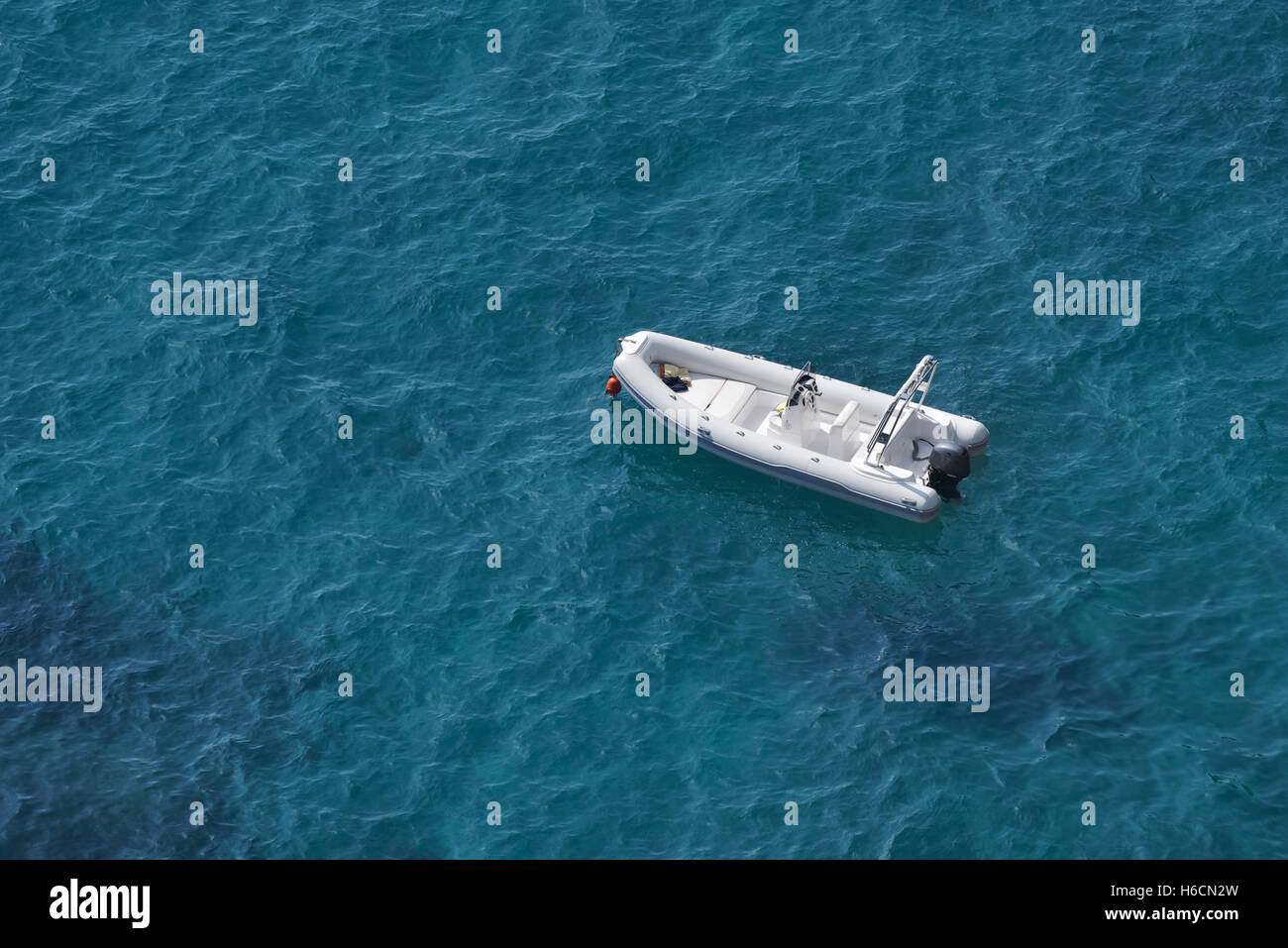 Aerial view of a white speed boat on a blue clear sea water Stock Photo ...