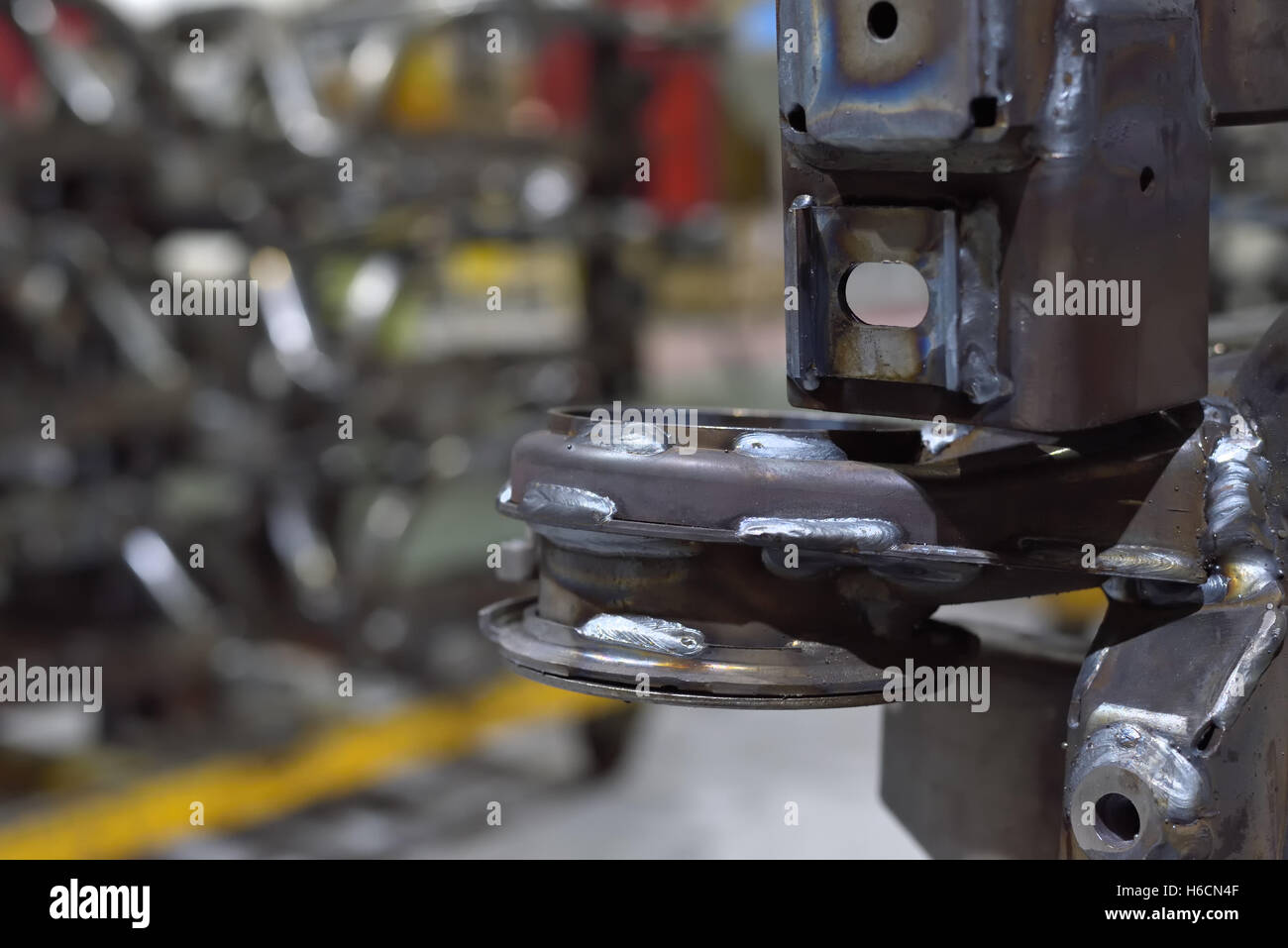 Metal car chassis welding in parts factory Stock Photo Alamy