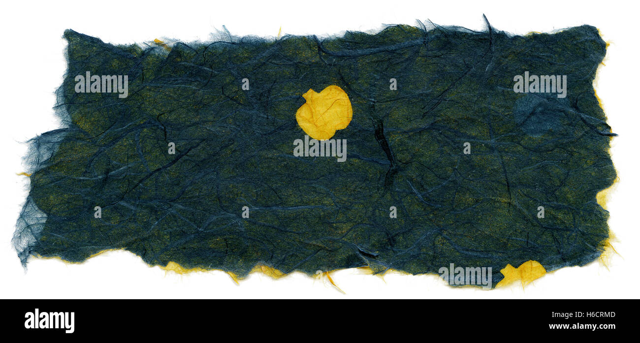 Texture of green, blue and yellow rice paper with a pattern of yellow fruit, maybe apples, decorating its surface, with torn edg Stock Photo