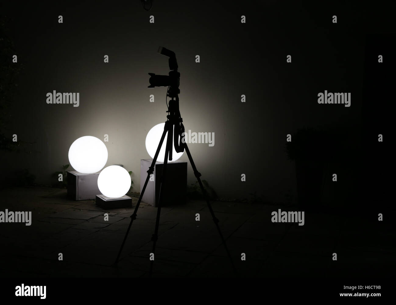 camera and tripod at work Stock Photo Alamy