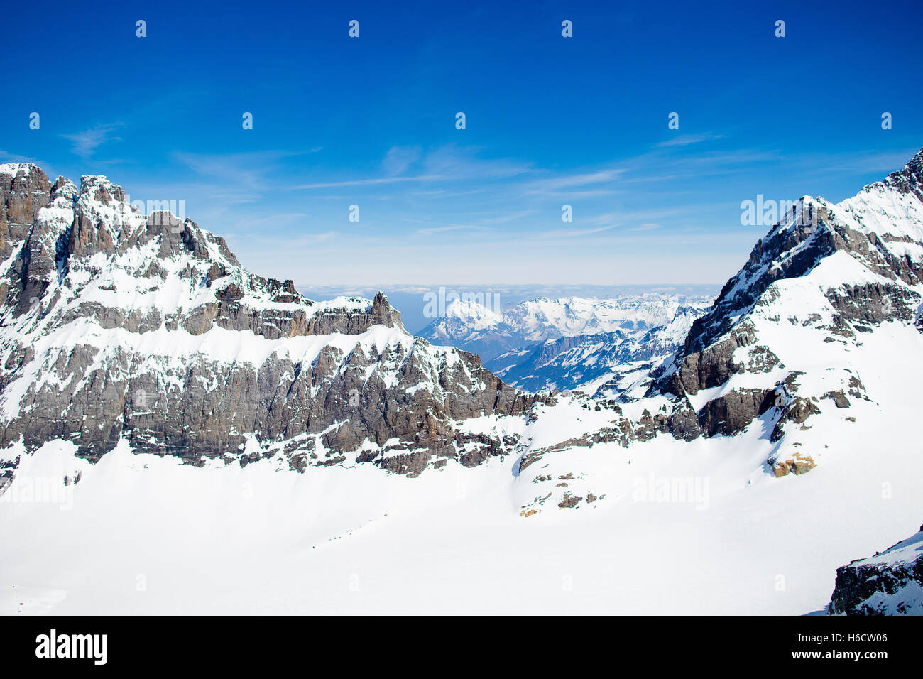 Aerial view of the Alps mountains in Switzerland. View from helicopter ...