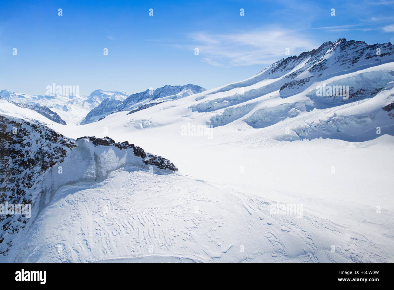 Aerial view of the Alps mountains in Switzerland. View from helicopter ...