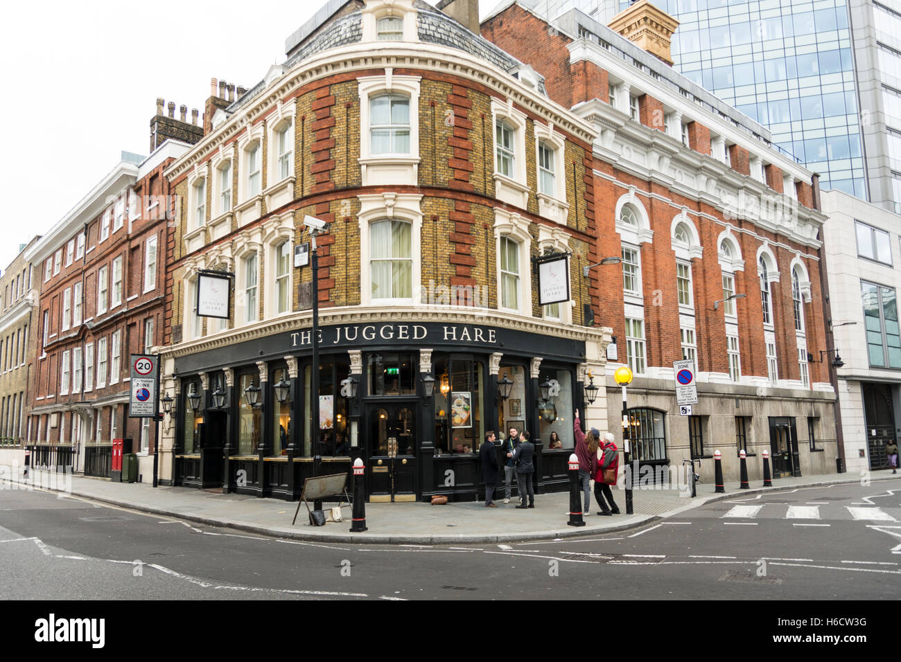 British gastropub in traditional London style with patrons drinking outside Stock Photo