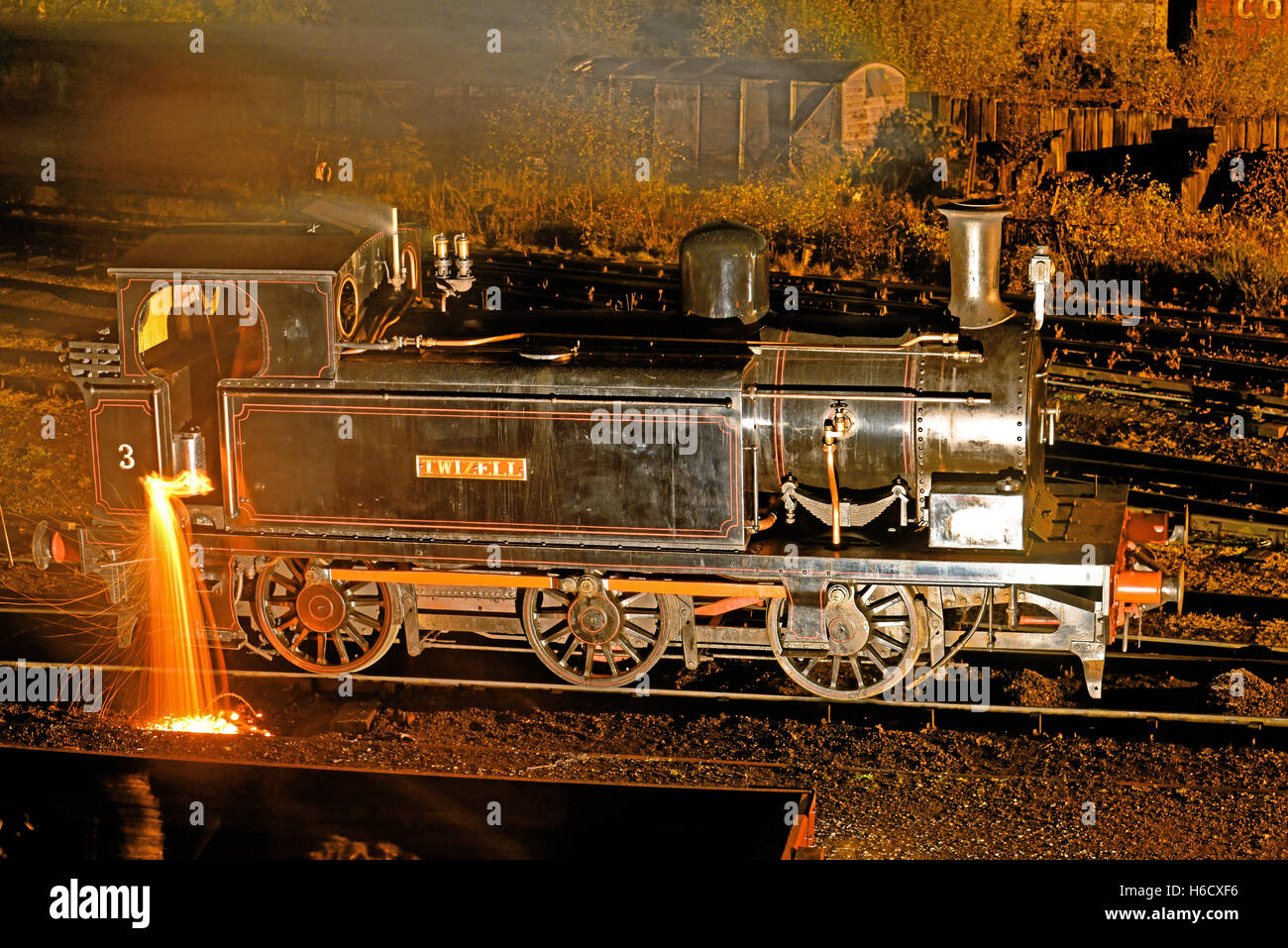 Twizell North Eastern night steam train damping down Stock Photo