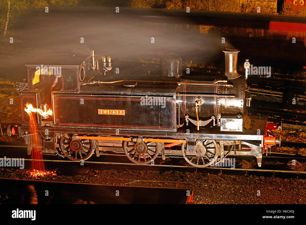 Twizell night steam engine train damping down Stock Photo