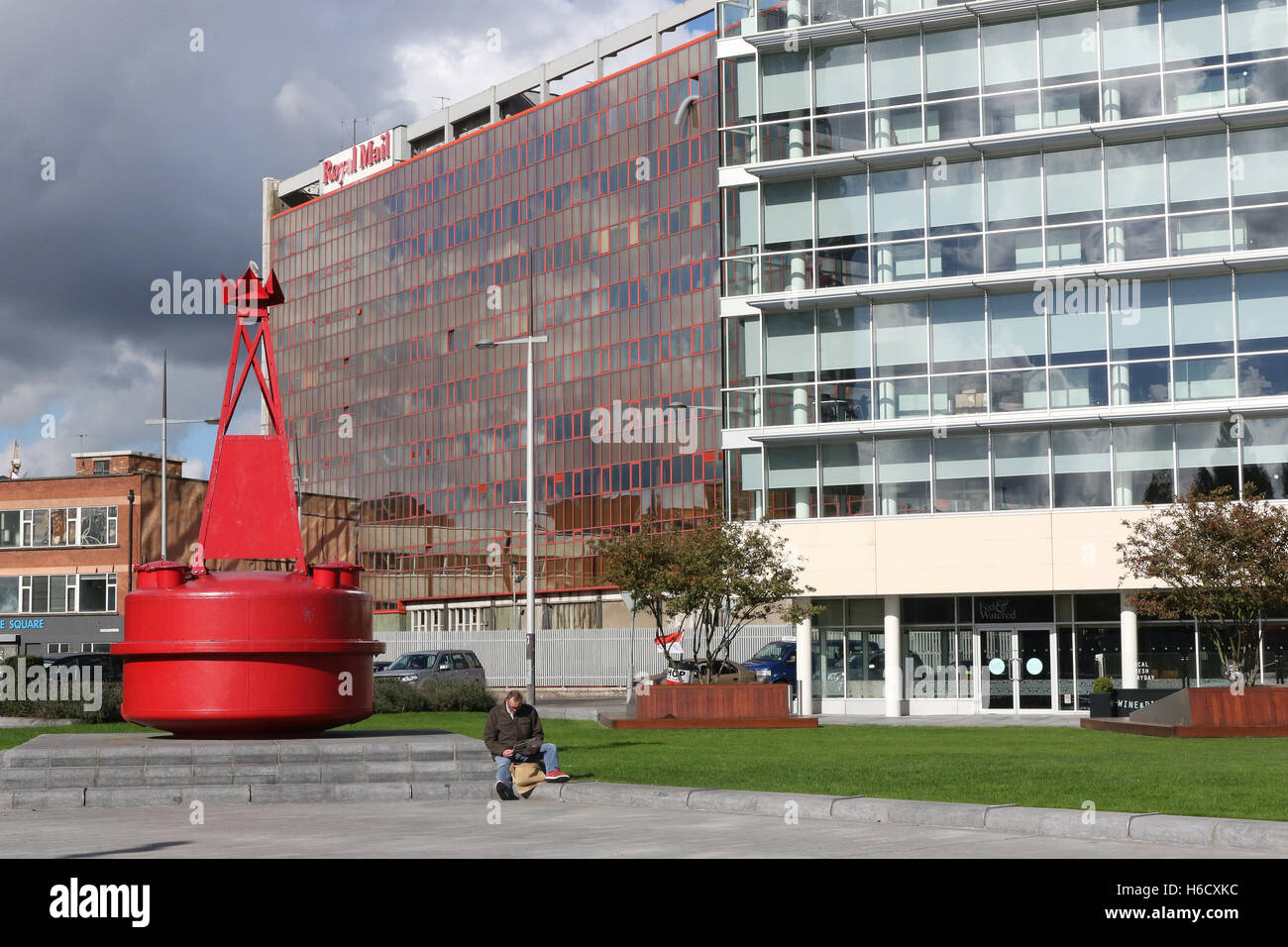 City marine heritage and art - Navigation buoy aid and public space at Donegall Quay, Belfast Stock Photo