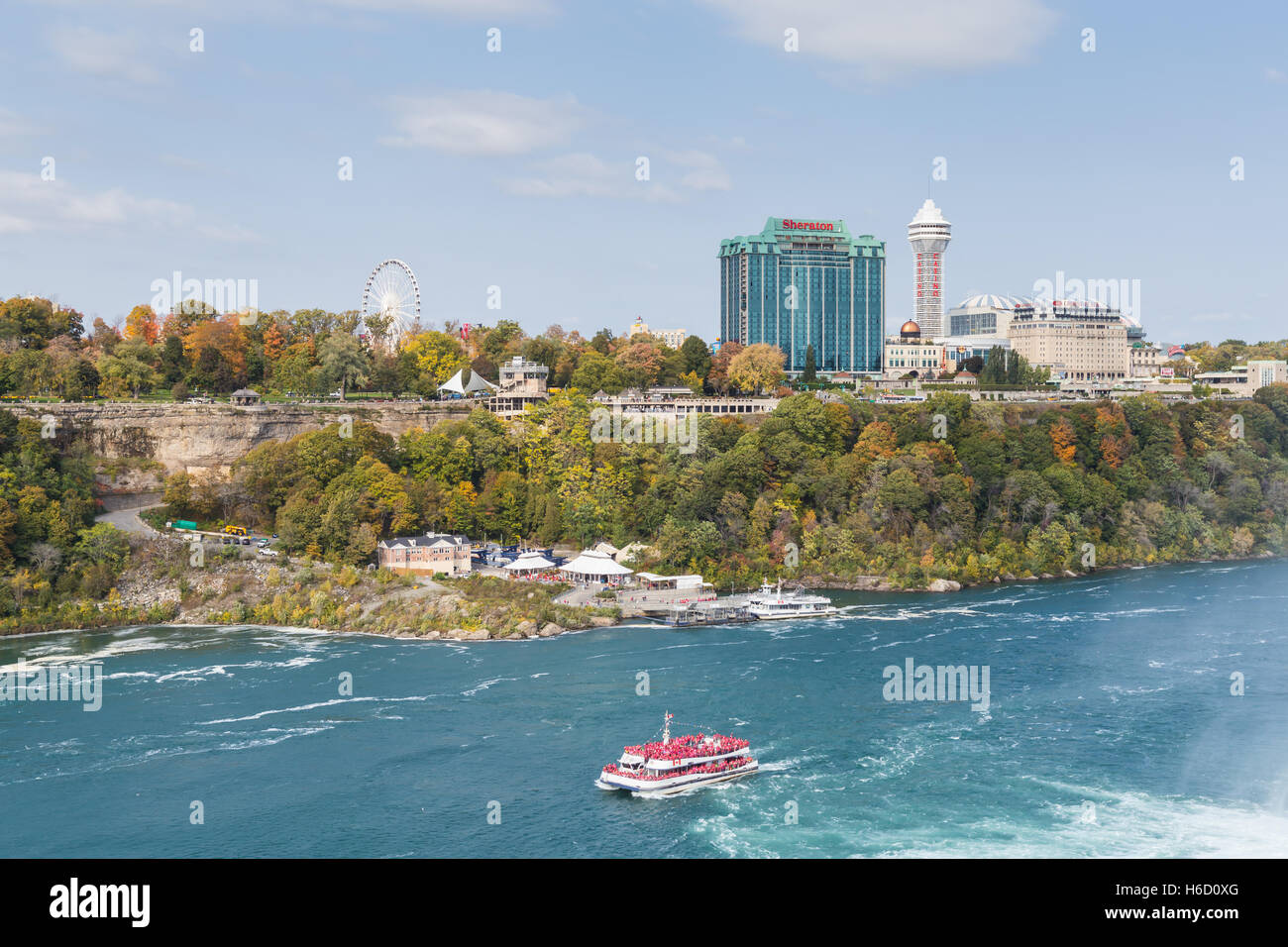 The Clifton Hill district in Niagara Falls, Ontario as viewed from Goat Island in Niagara Falls, New York during autumn. Stock Photo