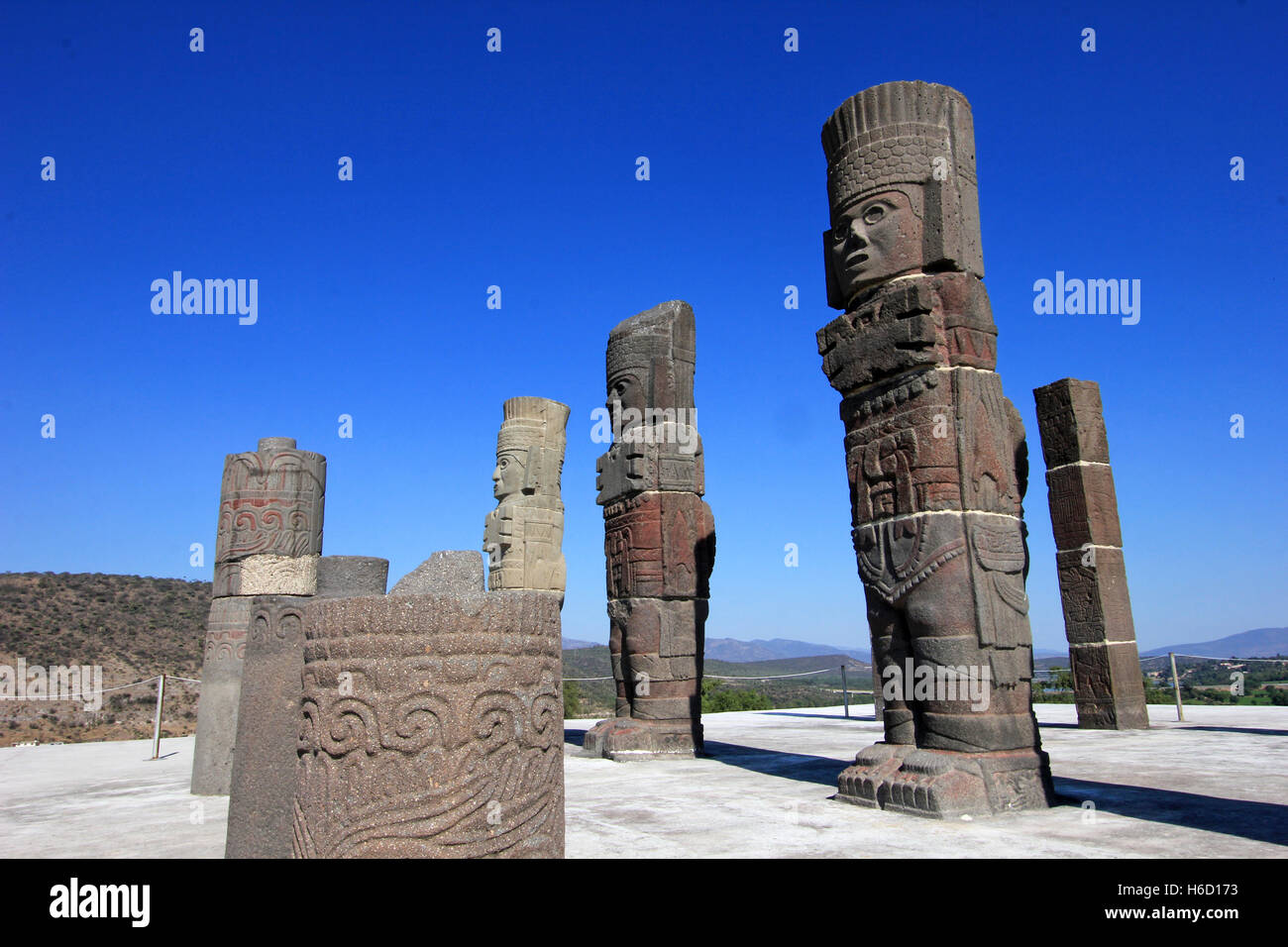 Toltec warriors columns topping the pyramid of Quetzalcoatl in Tula Stock Photo