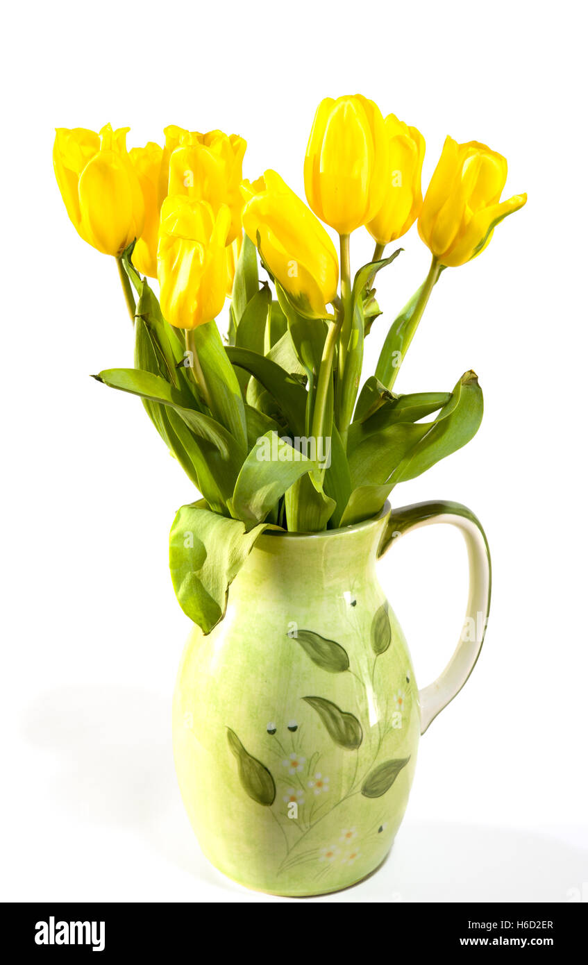 Flower bouquet from yellow tulips in vase isolated on white background ...