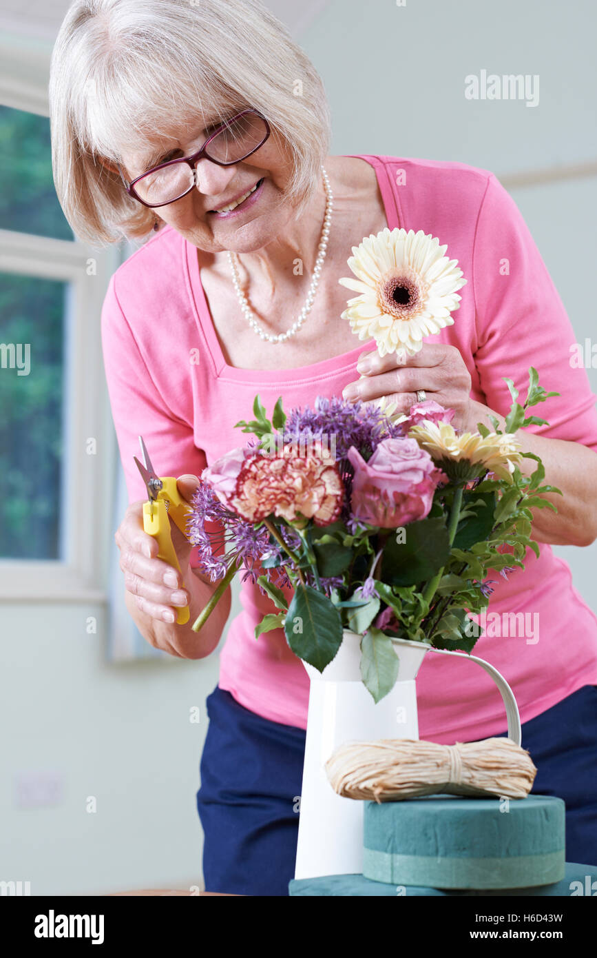 Senior Woman In Flower Arranging Class Stock Photo Alamy