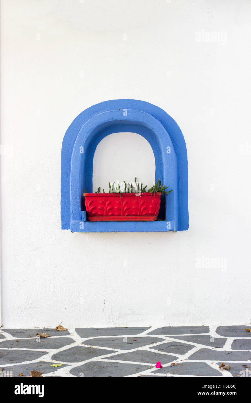 Blue decorative frame on the white wall Stock Photo