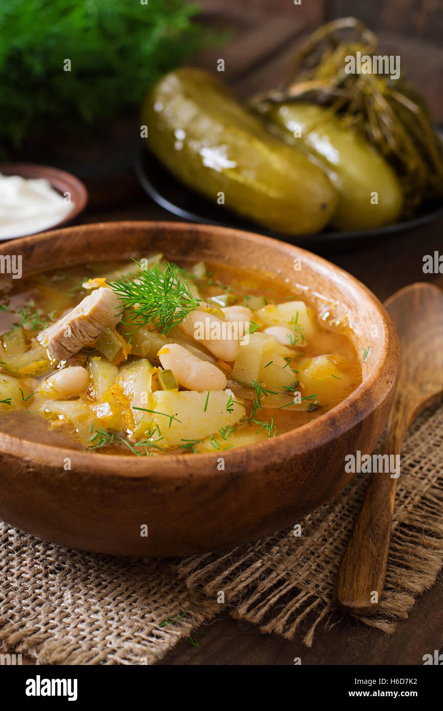 Soup with pickled cucumbers and beans in Ukrainian style Stock Photo
