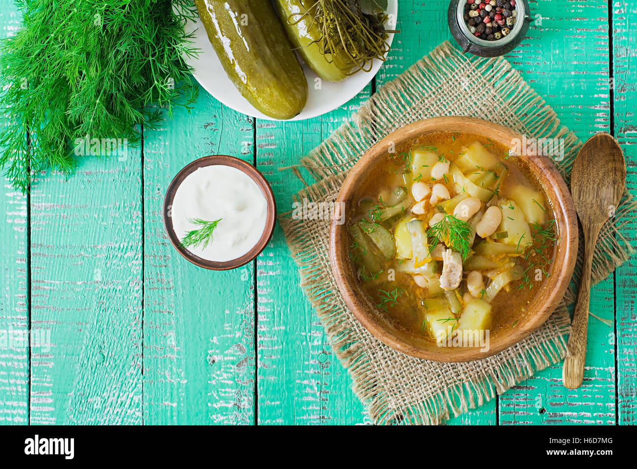 Soup with pickled cucumbers and beans in Ukrainian style Stock Photo