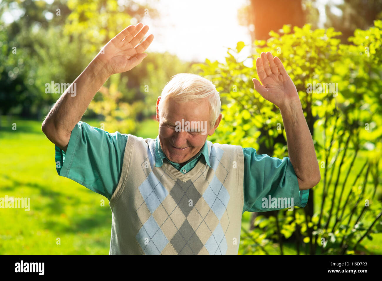 Man smiling and looking down. Stock Photo