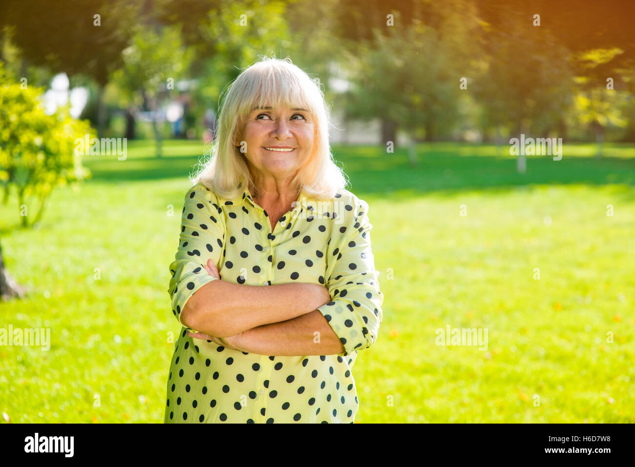 Woman with gray hair smiling. Stock Photo