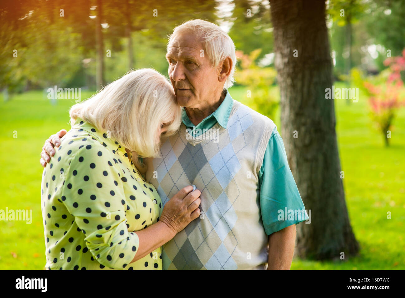 Woman leaning on man's shoulder Stock Photo Alamy