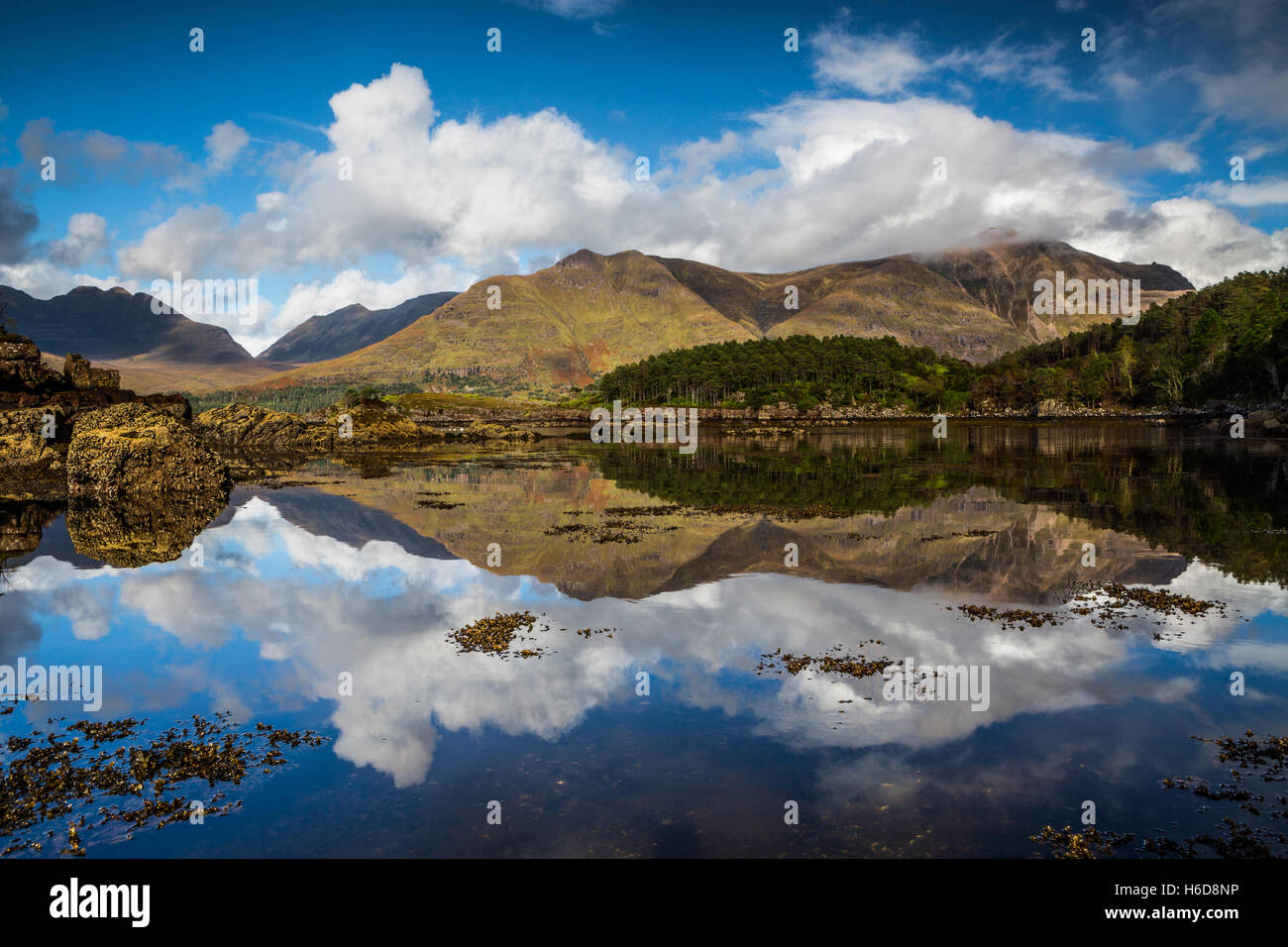 Reflection of Torridon Hills on Upper Loch Torridon. Stock Photo