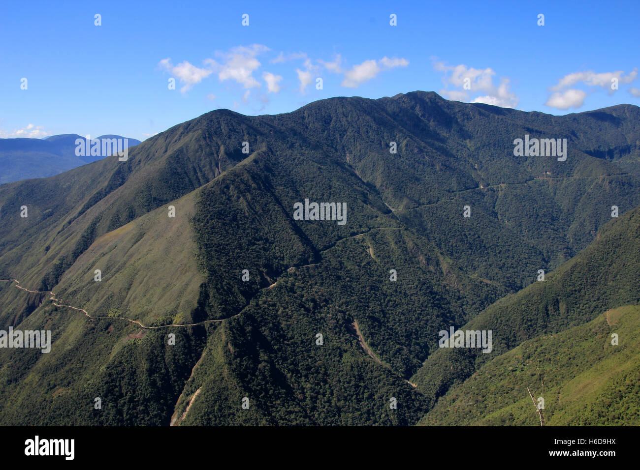 Panoramic view of Death Road, called North Yungas Road or Camino de la Muerte, the most dangerous road, leading down to the Yungas, Coroico, Bolivia Stock Photo
