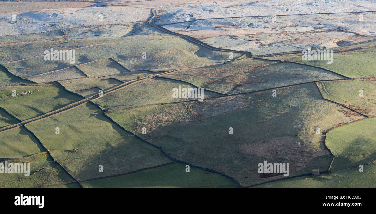 Elevated view over a patchwork of frosty fields from Simons Seat, Wharfedale, Yorkshire Dales, North Yorkshire, UK Stock Photo