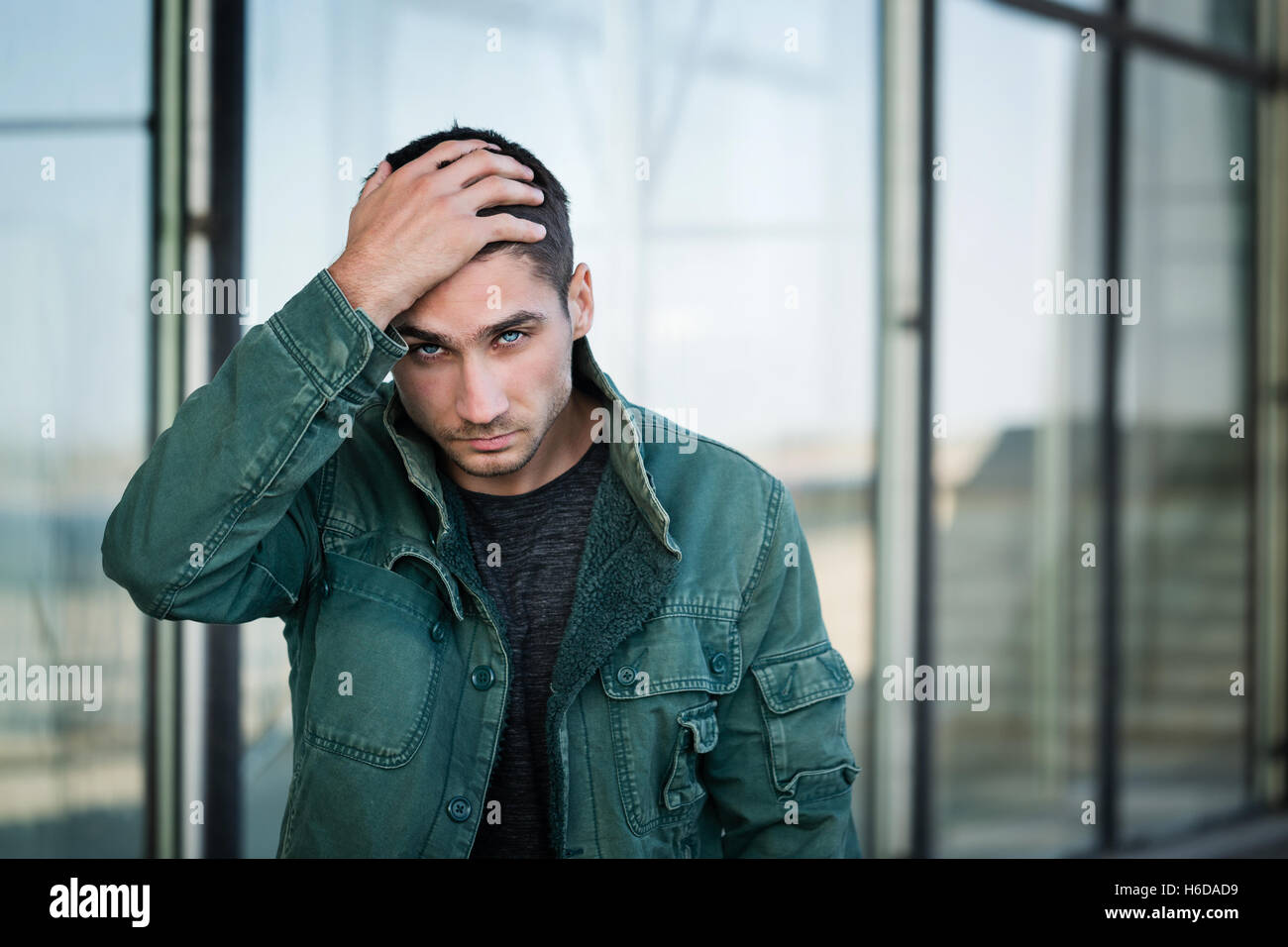 Portrait of a man with pale blue eyes. Men Health. Street fashion