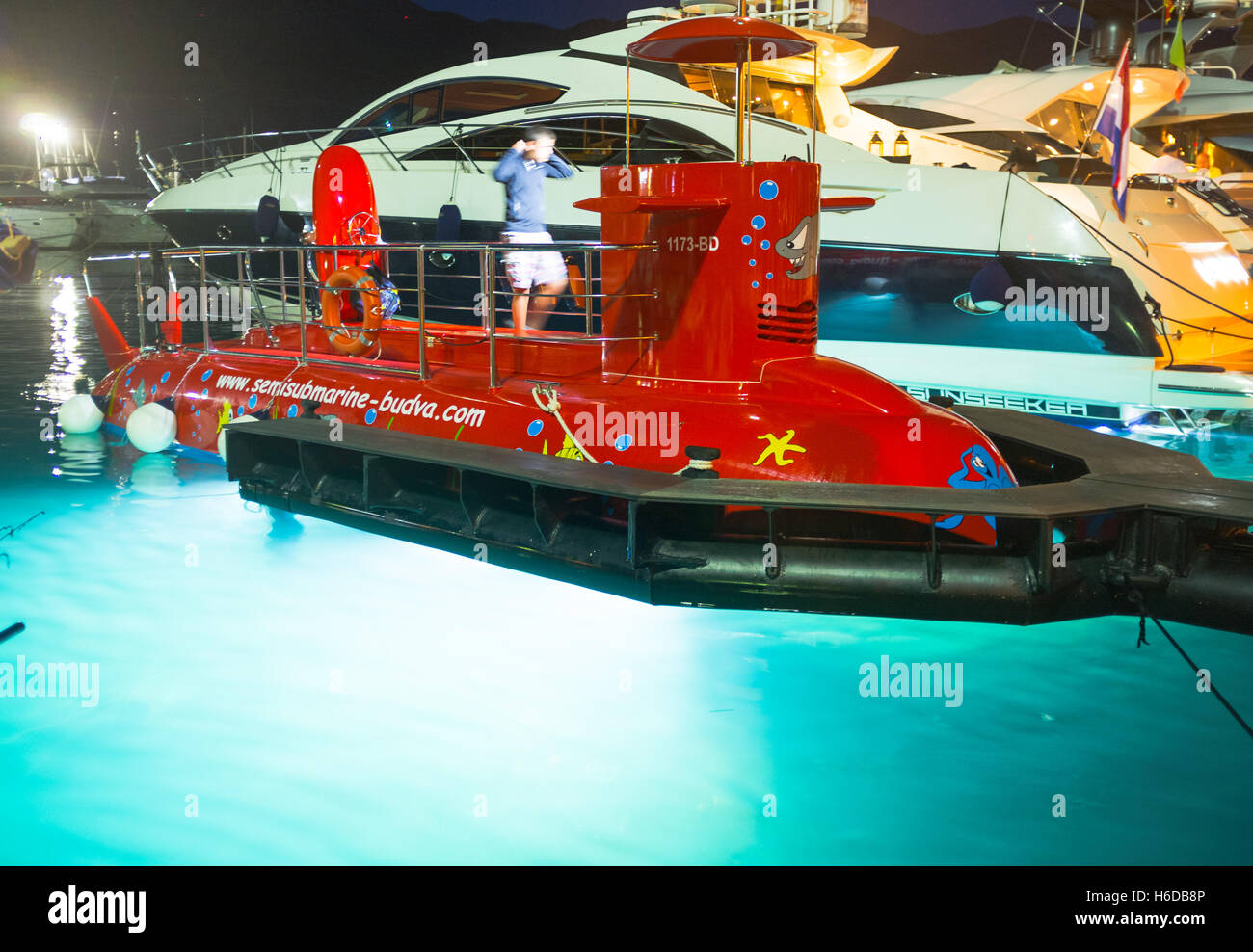 The glassbottom submarine demonstrates its powerful lights for the