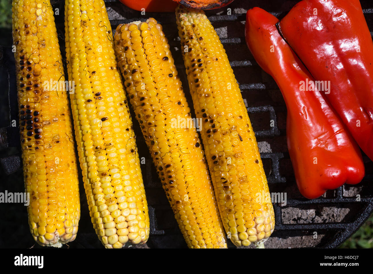 Roasted vegetables on grill corn and peppers Stock Photo Alamy