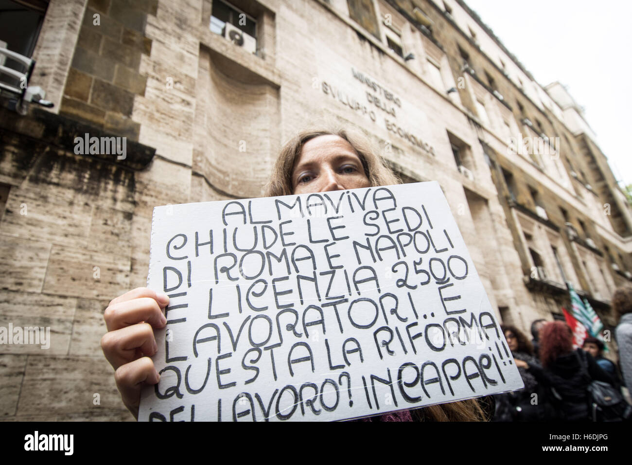 Rome, Italy. 27 October 2016. Protest in Rome call center Almaviva workers in front of the Ministry of Economic Development against the company's decision to close its offices in Rome and Naples with the consequent dismissal of 2,511 working men and women, pictured the protest of workers Almaviva Credit: Andrea Ronchini/Alamy Live News Stock Photo