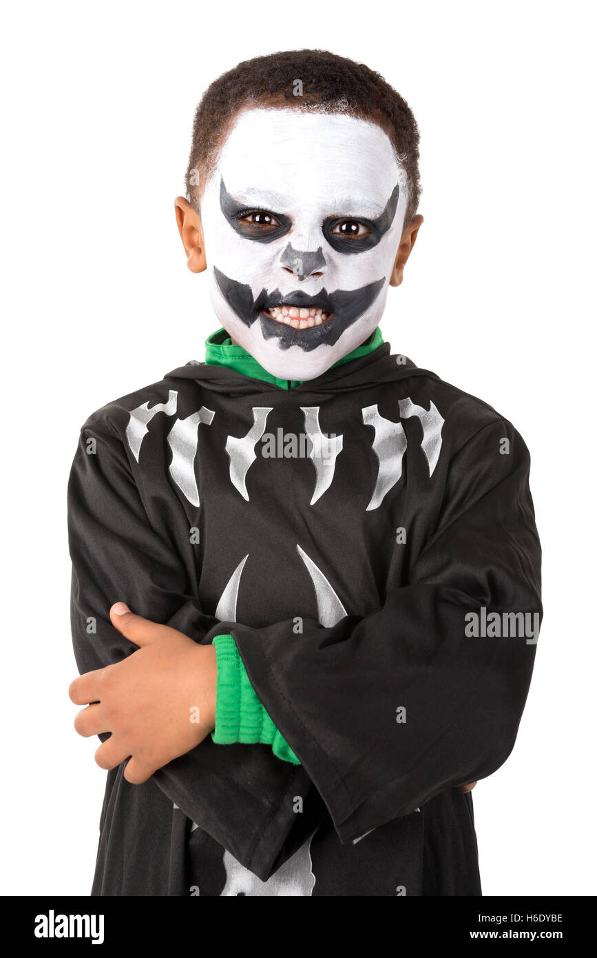 Boy with face-paint and skeleton Halloween costume isolated in white Stock Photo