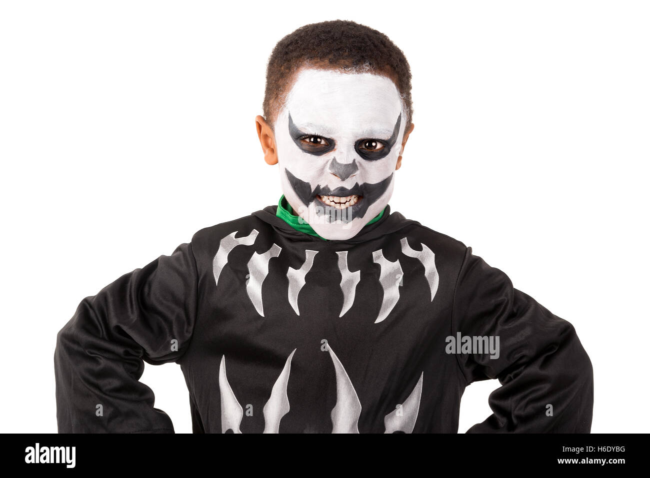 Boy with face-paint and skeleton Halloween costume isolated in white Stock  Photo - Alamy