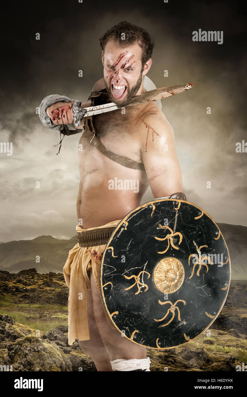 Ancient barbarian warrior or Gladiator ready to kill Stock Photo