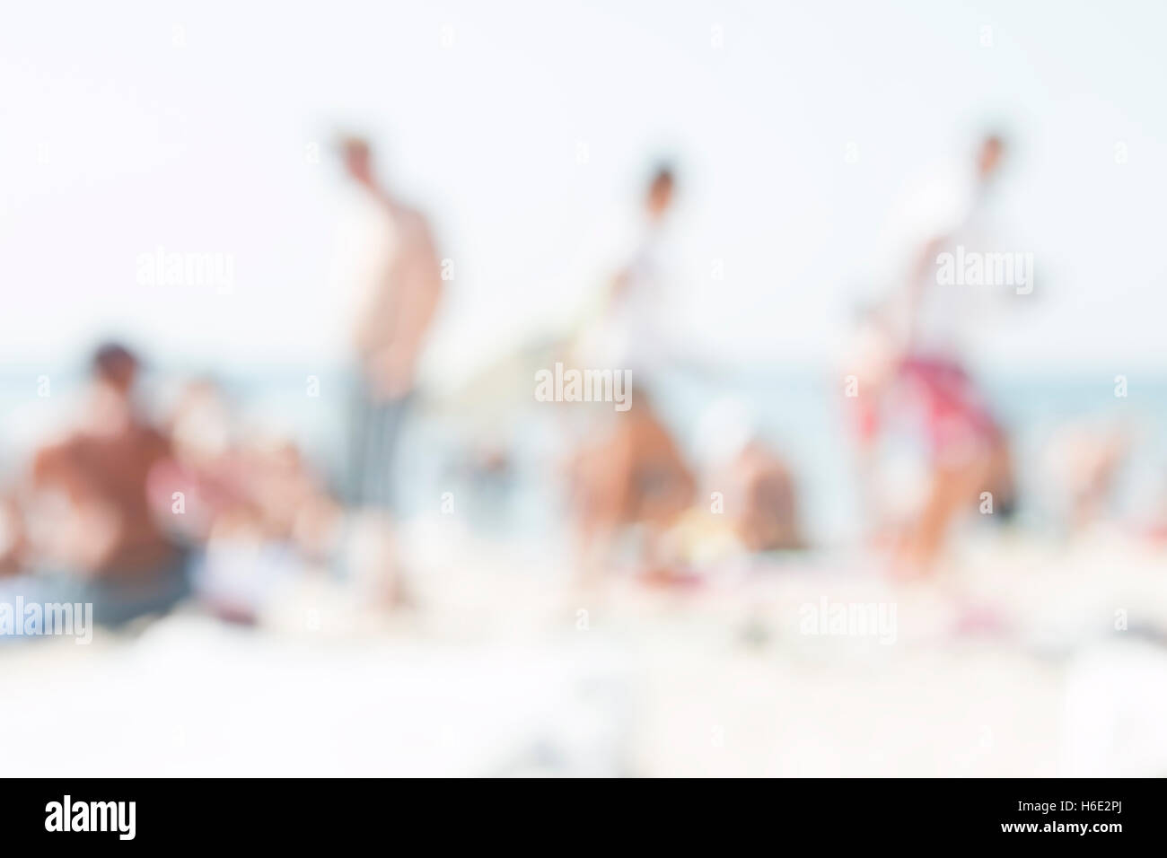 People and beach, visit beaches idea, blurred photo for background. Stock Photo