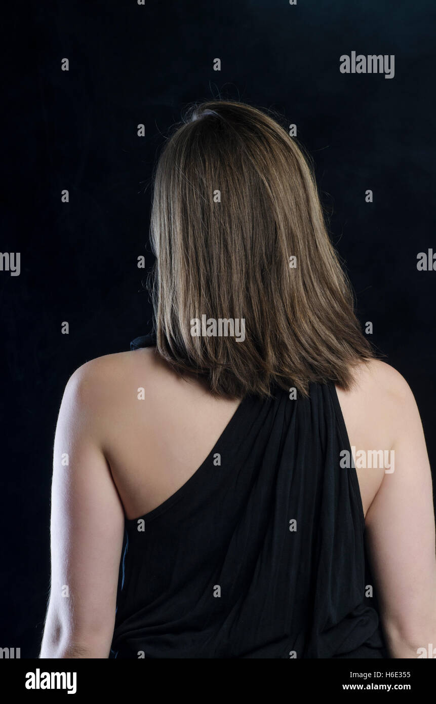 Female black woman standing back hi-res stock photography and images ...