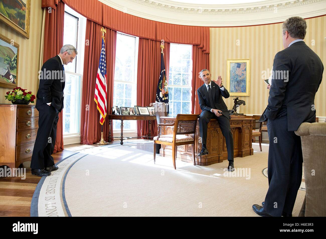 U.S. President Barack Obama talks with Chief of Staff Denis McDonough ...