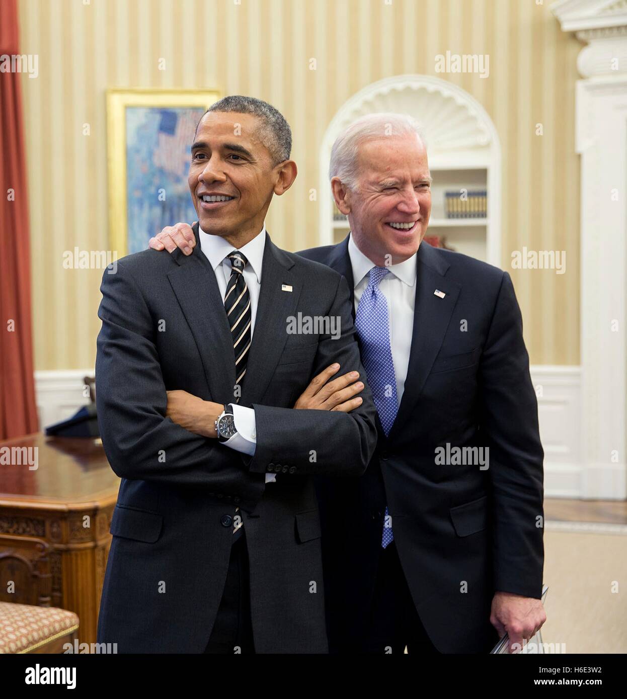 U.S. President Barack Obama jokes with Vice President Joe Biden in the White House Oval Office February 9, 2015 in Washington, DC. Stock Photo