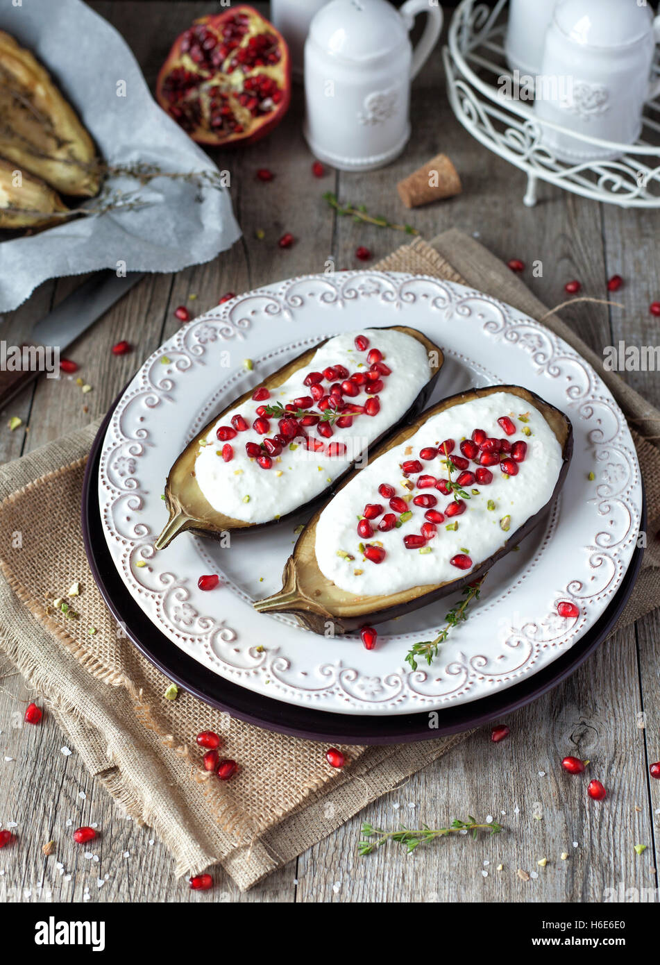 Roasted eggplants with yogurt sauce Stock Photo Alamy