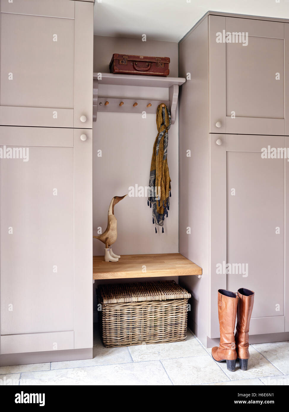 Bespoke fitted cupboards & hanging space in a UK country home Stock Photo