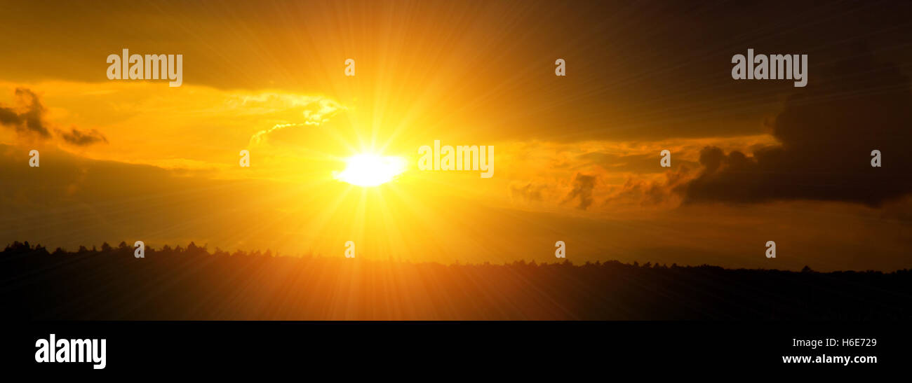 Panoramic photo of a bright sun in the sky Stock Photo