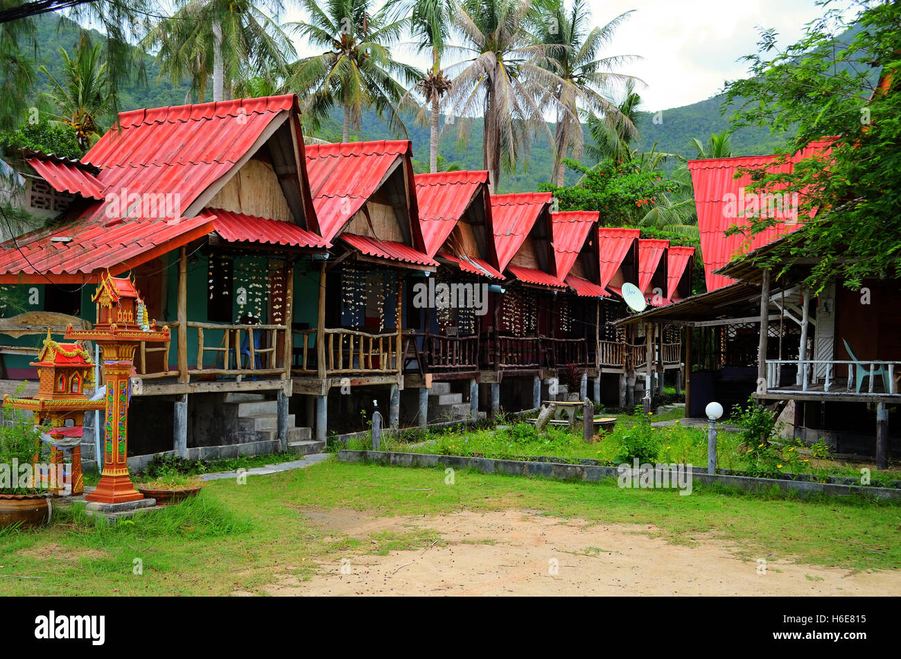 Koh Phangan, Thailand - August 30, 2014: Red roof bungalows in Chalok Lam Bay. Stock Photo