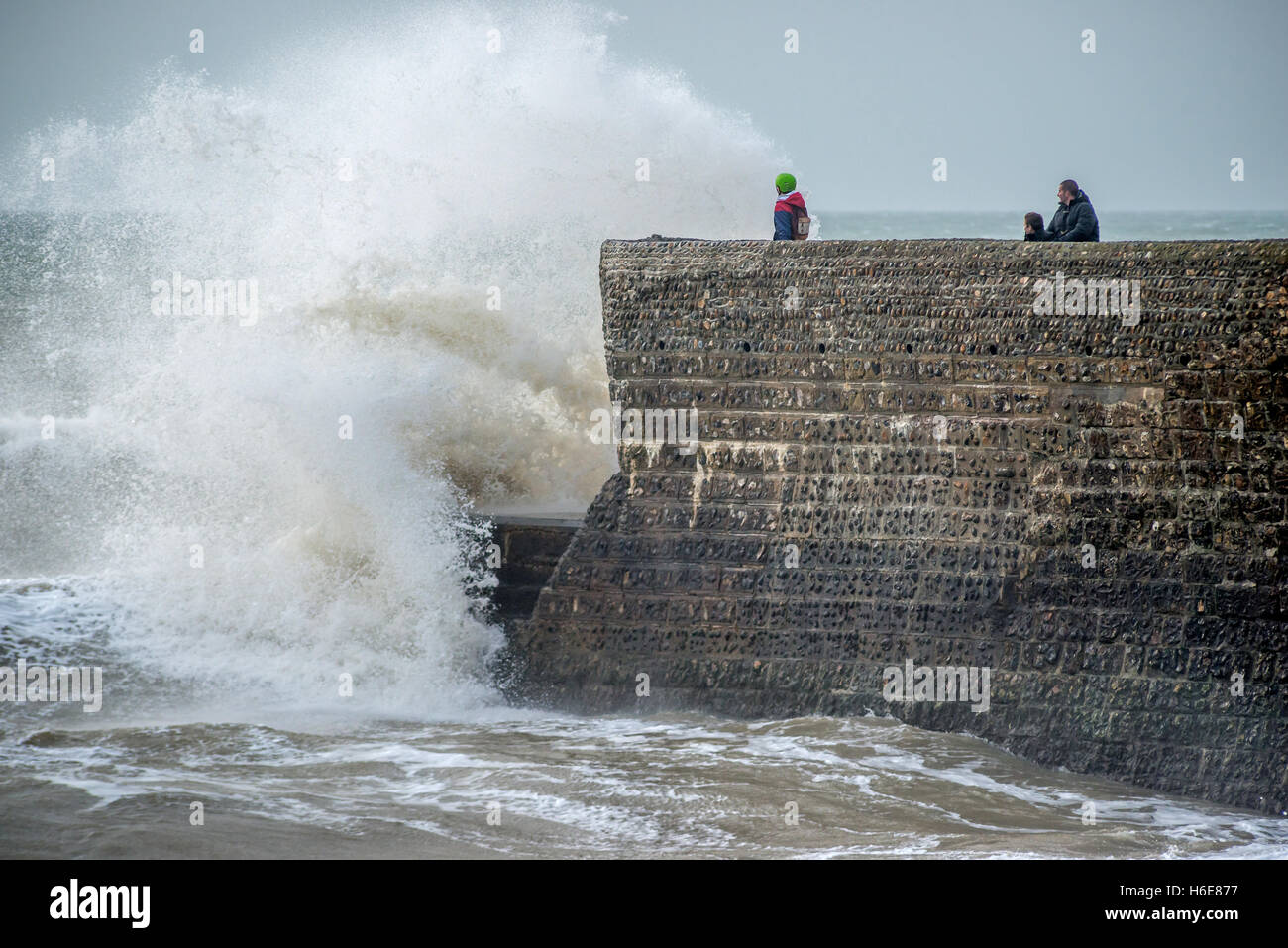 Waves crashing onto Brighton beach Stock Photo