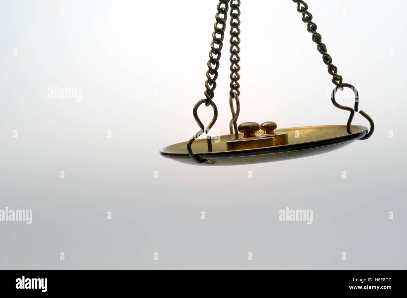 Old Golden weighing scale balance Stock Photo