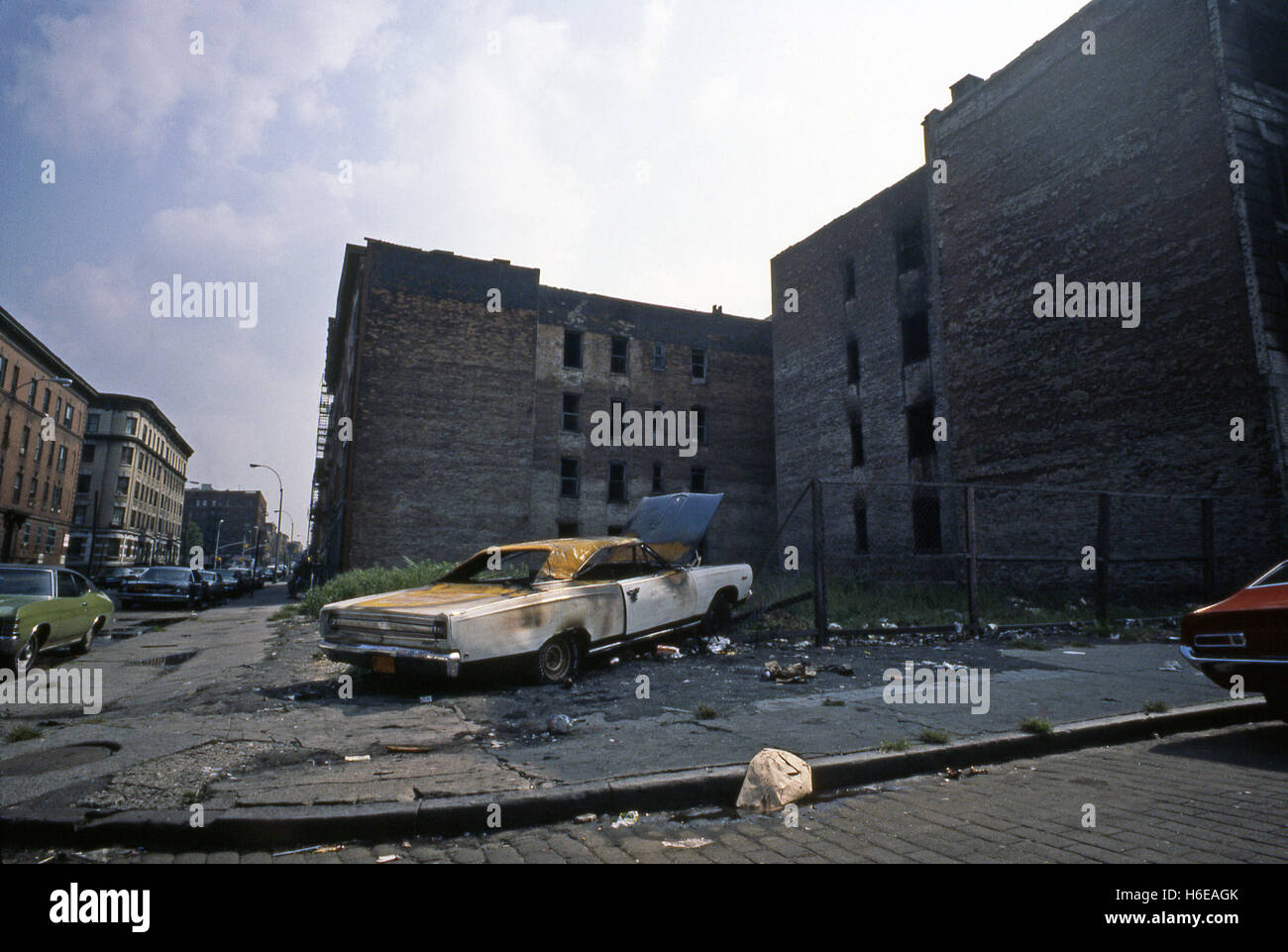 Abandoned car in the South Bronx, New York City, USA 1977 Stock Photo