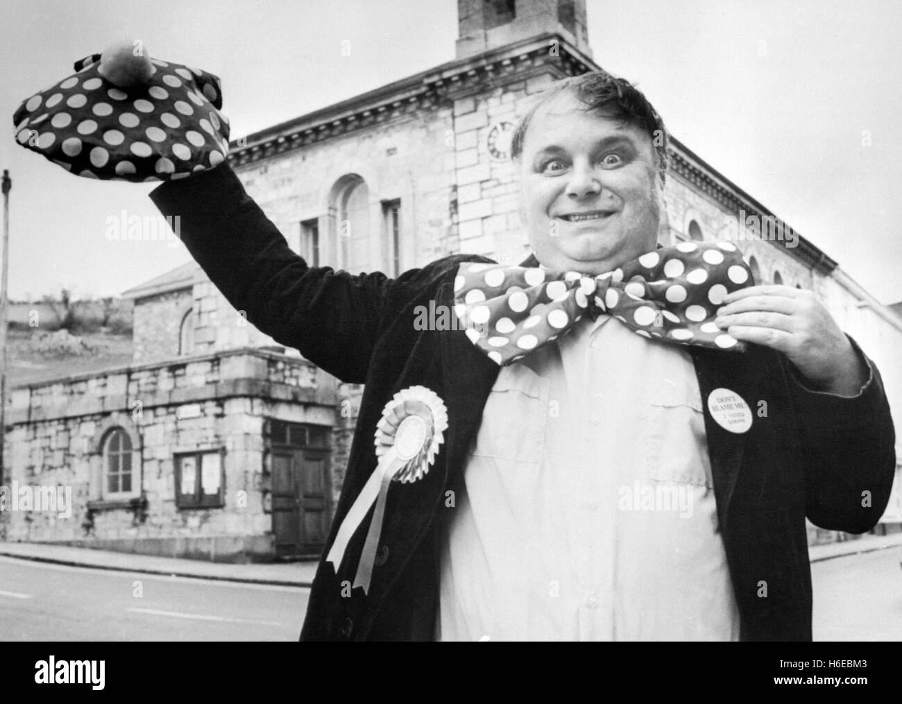 Eccentric publican Alan Hope celebrates outside Ashburton Town Hall in Devon after becoming the first Monster Raving Loony Party candidate to be elected to office. The 44-year-old Party chairman, who holds his meeting in the Golden Lion pub, was unopposed in the local elections and automatically elected.  *UK Provs OnlyPA AF 222713-1 Stock Photo