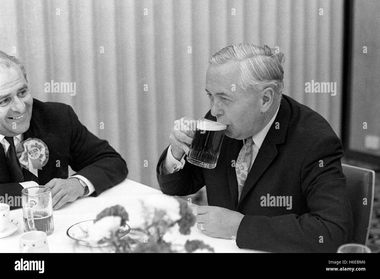 Harold Wilson takes a break with a glass of beer during a Election Day canvassing in his Huyton constituency.PA AF 146300-15 Stock Photo