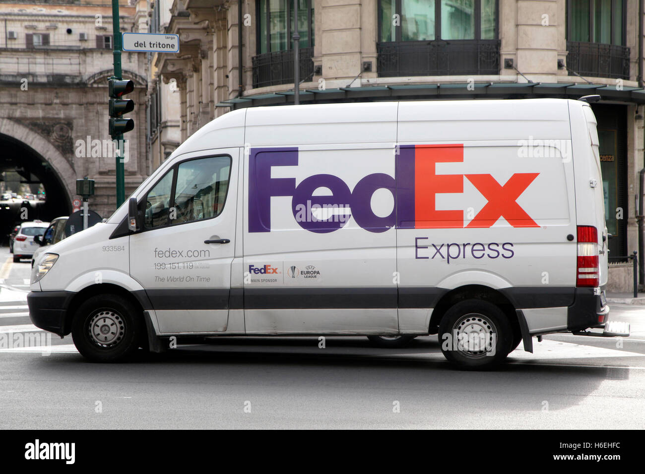 FedEx Express truck in midtown Rome. FedEx Corporation is a US multinational courier delivery services company Stock Photo