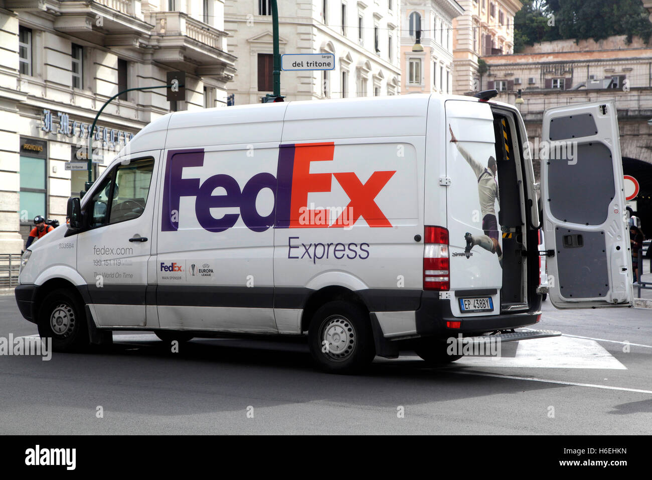 FedEx Express truck in midtown Rome. FedEx Corporation is a US multinational courier delivery services company Stock Photo