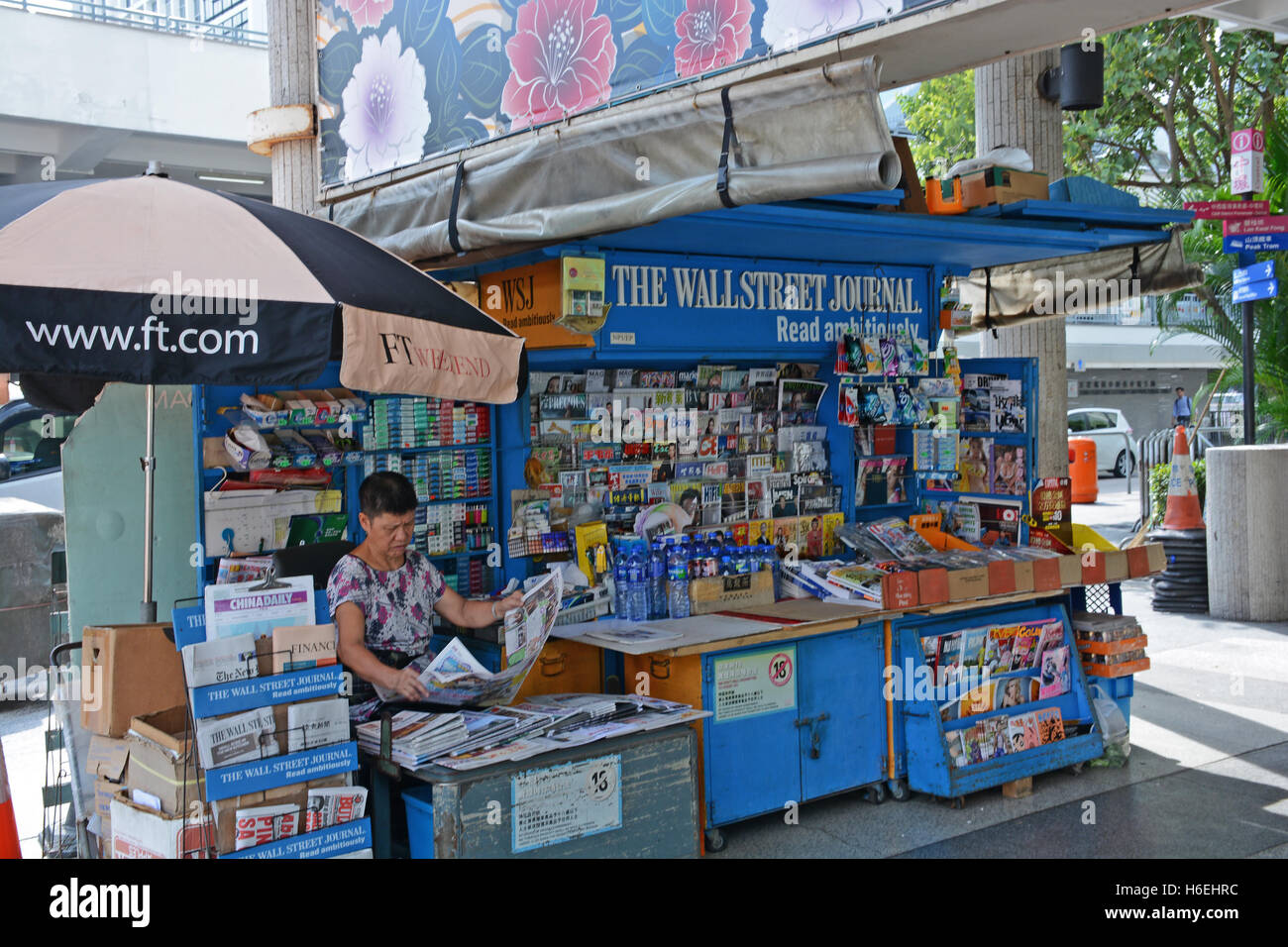newspaper stall stand in downtown Central district, Hong Kong island China Stock Photo
