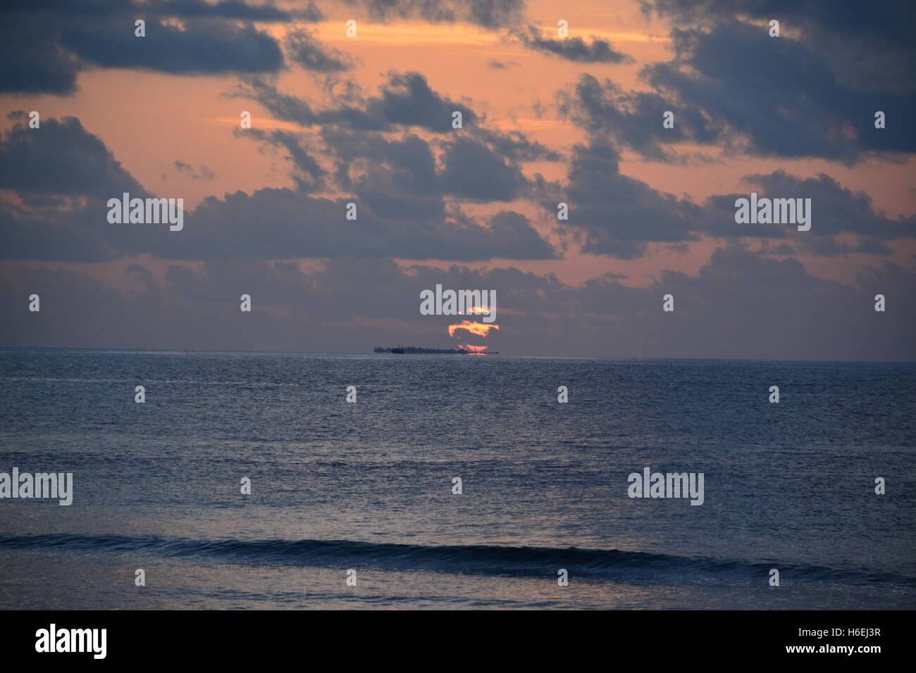 Maldives sun set water Stock Photo
