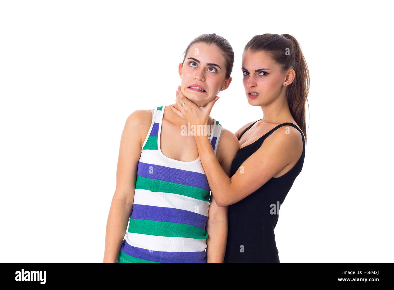 Young woman keeping another woman's throat Stock Photo