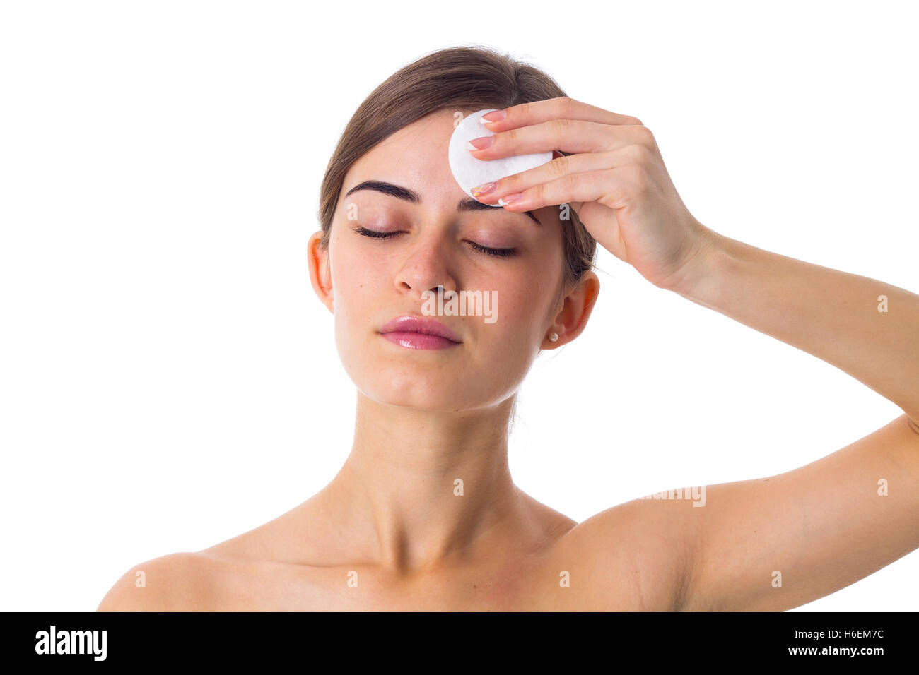 Young woman using cotton pads Stock Photo Alamy