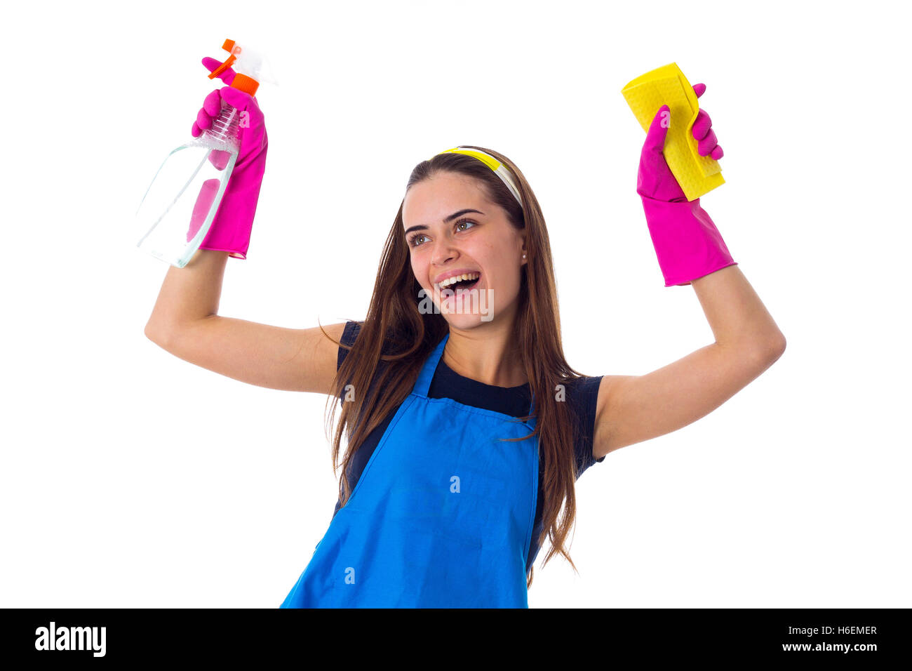Woman holding detergent and duster Stock Photo - Alamy